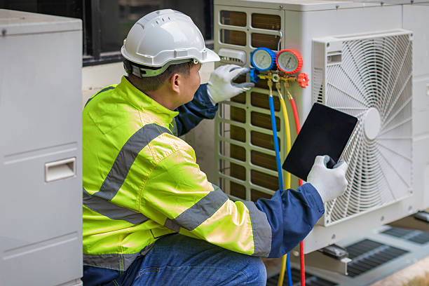 Professional Heat Pump Repair technician working in Awendaw, SC